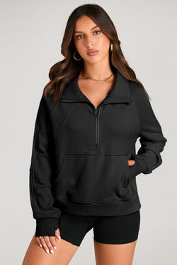 Black sweatshirt with stand-up collar and kangaroo pocket with quarter-turn zip