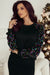 Black crew neck sweatshirt with raglan sleeves with sequins