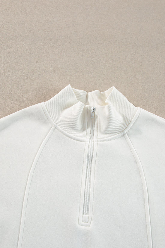 White zip-up sweatshirt with dropped shoulders