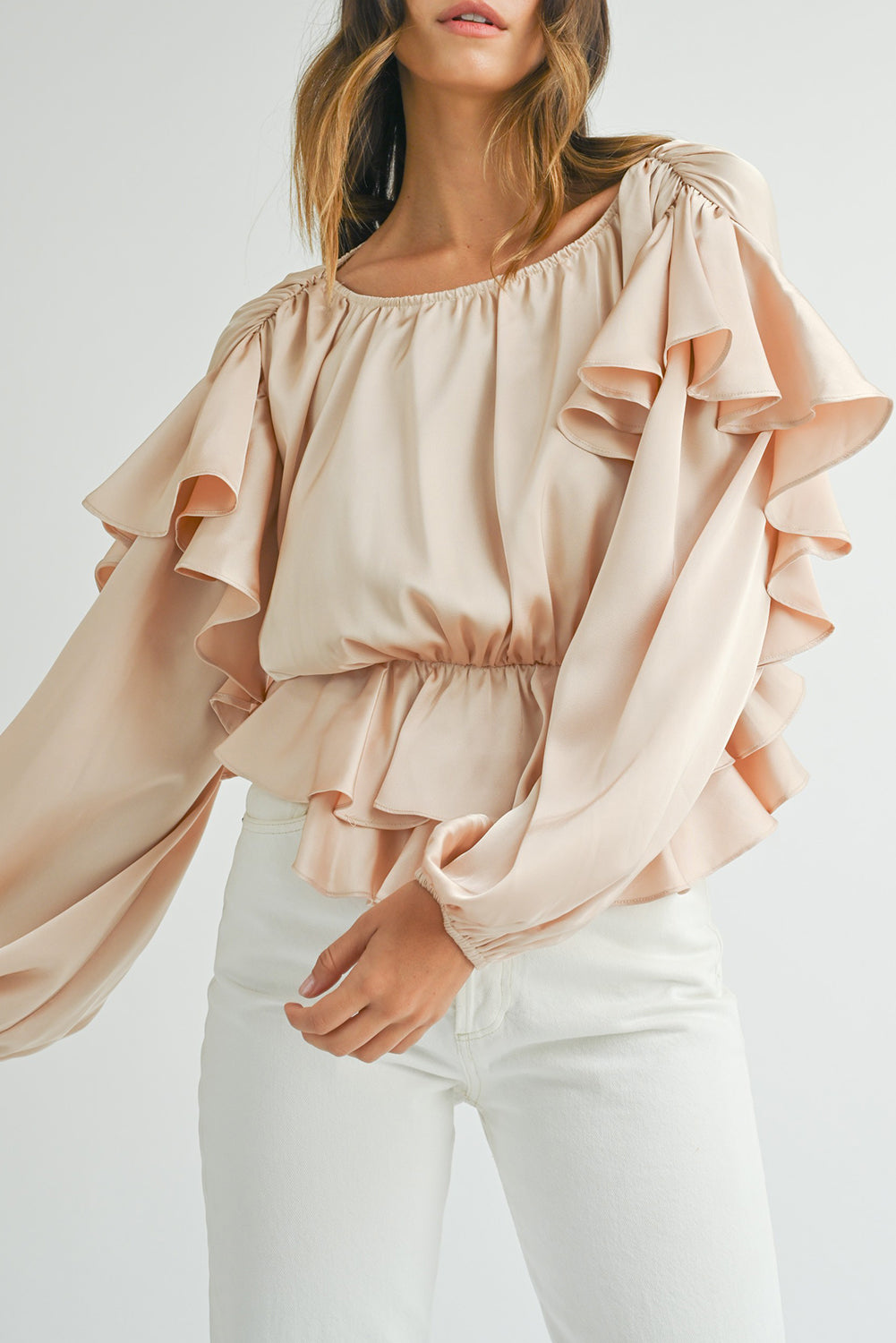 Blouse péplum à volants dans le dos avec trou de serrure à lacets et à l'avoine