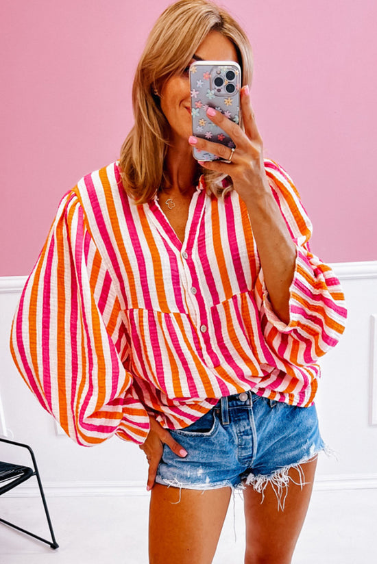 Orange striped blouse, balloon sleeves, notched v collar, buttoned on the front