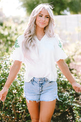 Blouse blanche à col de fleurs-A WOMAN WE LOVE