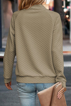 Apricot quilted sweatshirt with button-down neckline and stand-up collar