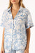 Shirt with short sleeve shirt and blue flower shorts