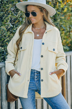 Beige button-down shirt jacket with turn-down collar