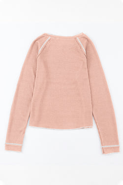 Long -sleeved textured high and apricot pink round pink neck *