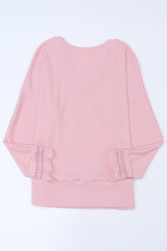 Long sleeve top and pink V -collar with ribbed texture and lace border