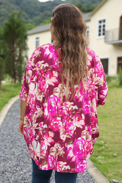 Gran blusa roja con estampado floral *