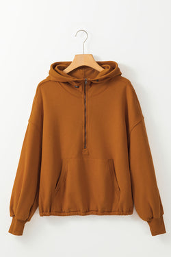 Brown zip-up hoodie with kangaroo pocket and ribbed trim