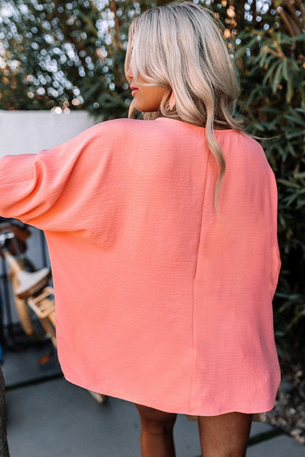 Top de poignet rose à la blouse rose