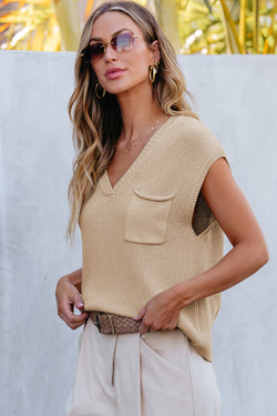 Ribbed sweater with short sleeves and apricot chest pocket