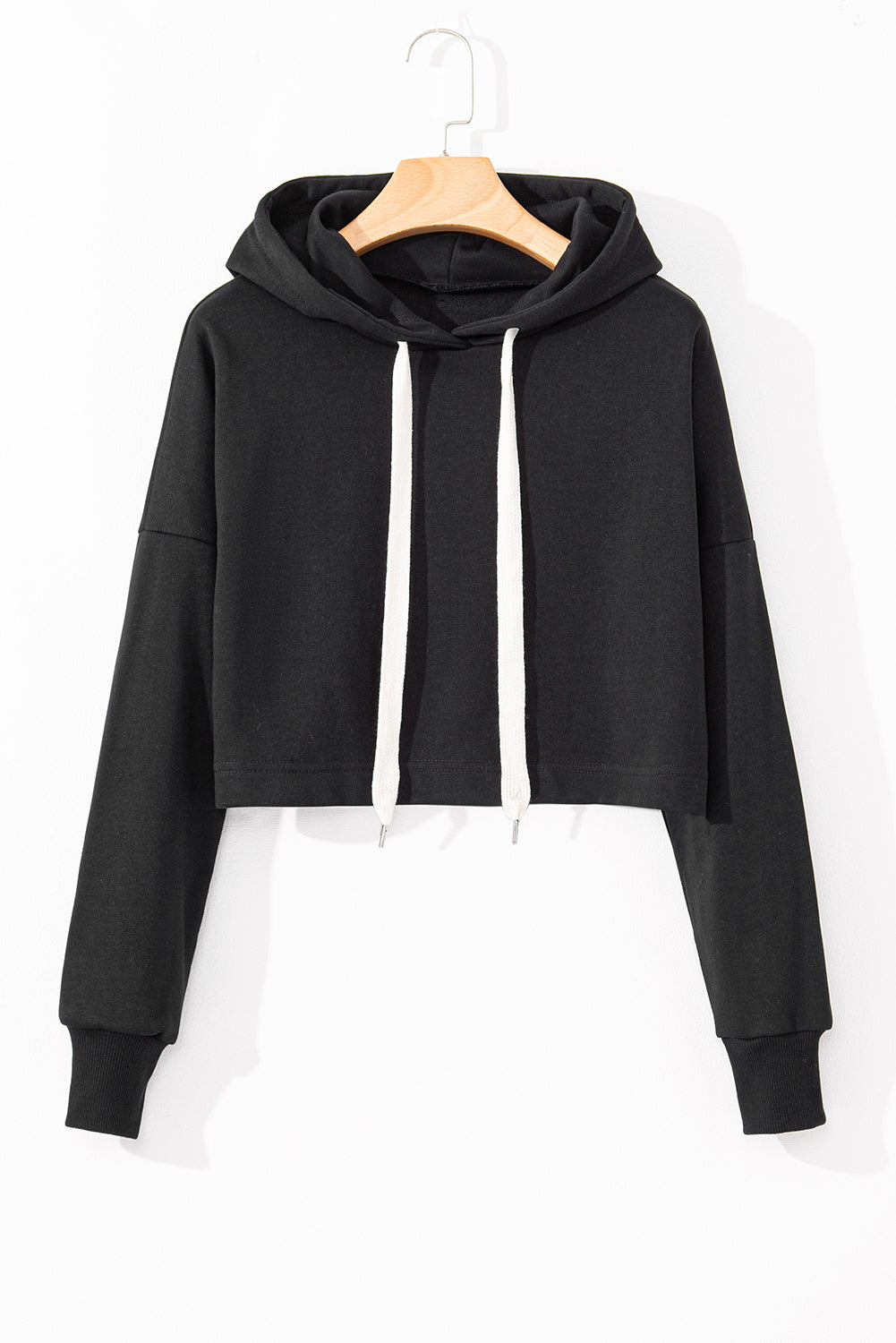 Short black hooded plain with drooping shoulders *