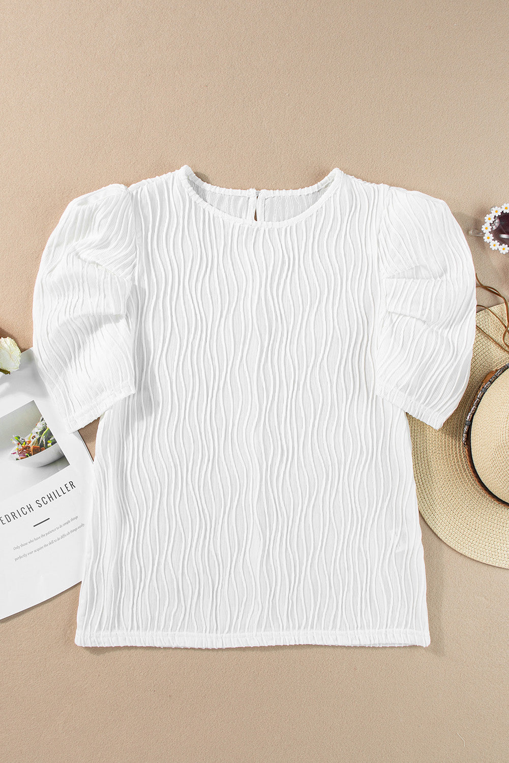 Textured white t-shirt with puffy short sleeves