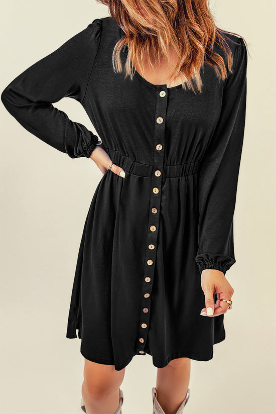 Robe noire boutonnée taille haute à manches longues