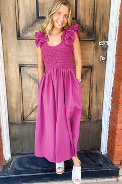 Vestido de ceño largo con una paja roja enyesada con correas