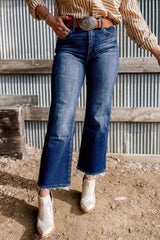 High-waisted flared jeans in sail blue with mineral wash and raw hem