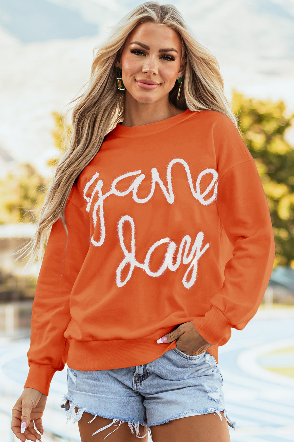 Sudadera gráfica de hombro caída y day de juegos de ruso naranja guirnaldas