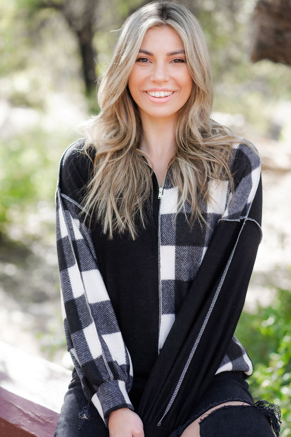 Black checkerboard patchwork collared top with exposed seams