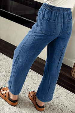 Large right denim pants with tightening cord and blue mineral washing