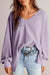 Ample blouse with embossed orchid petals, V -neck, long sleeves, falling shoulders