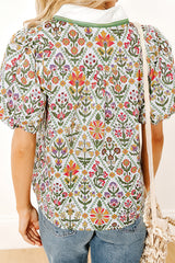 Chemise verte à manches courtes bouffantes et à fleurs