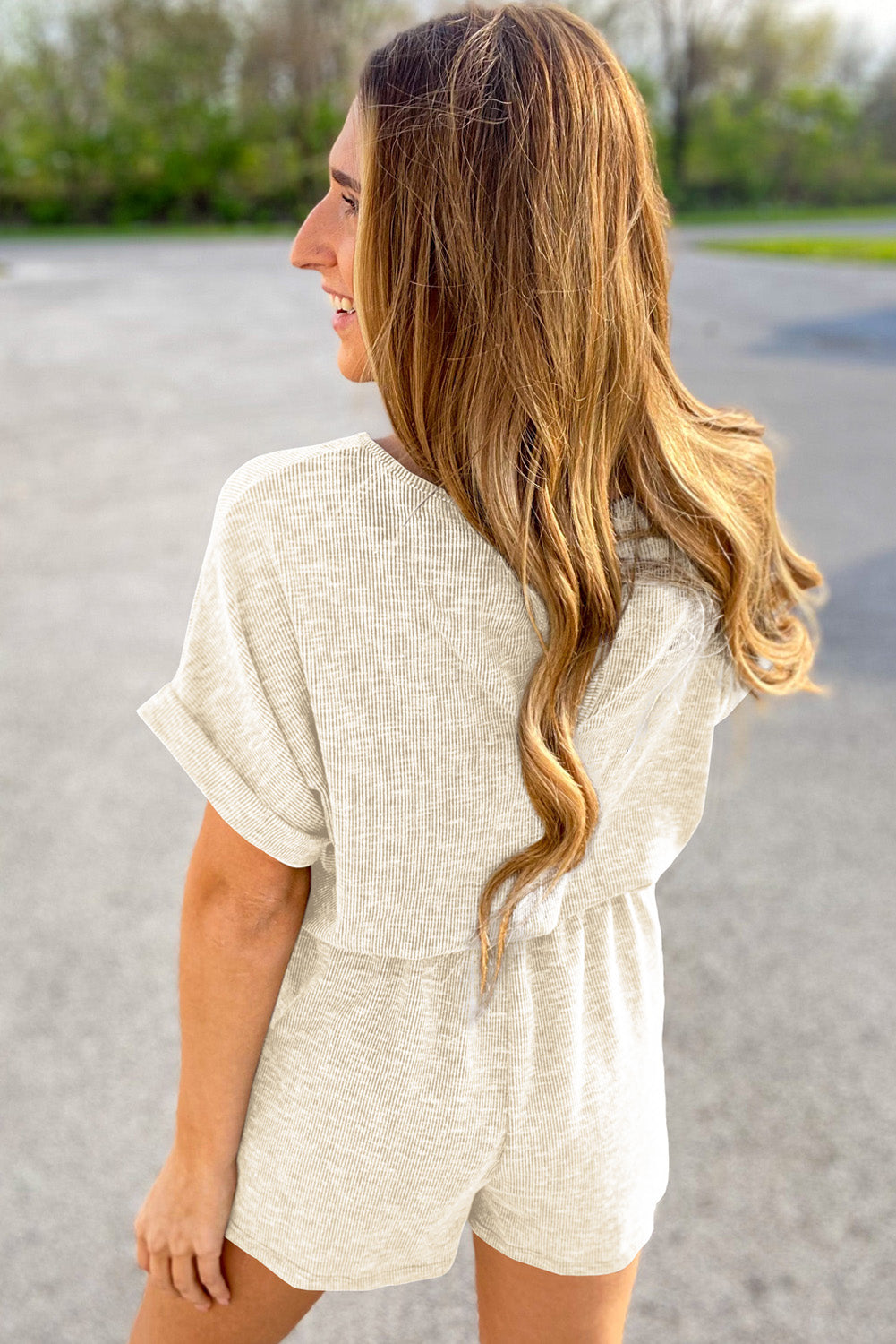 Beige ribbed romper with elastic waist