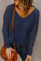 Blue V-neck top with sheer stripes