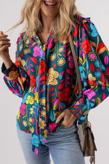 Chemisier vert à manches bouffantes et col fendu avec nœud floral-A WOMAN WE LOVE