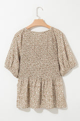 Smocked top with puffy sleeves and floral print