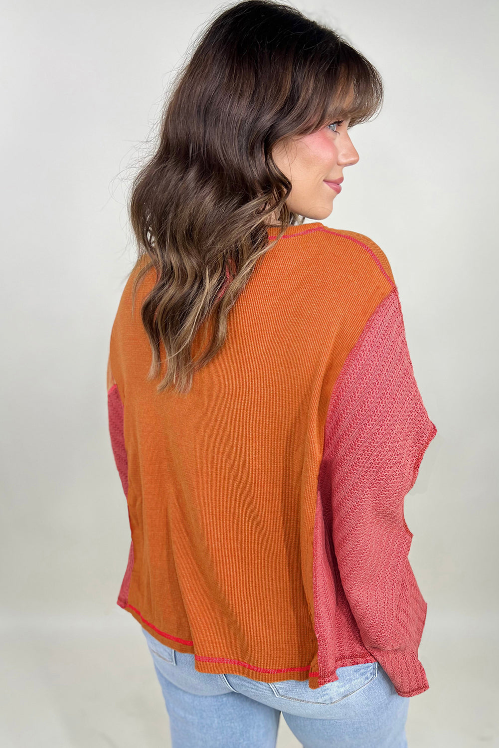 Haut orange en tricot texturé avec bloc de couleurs et poche poitrine en patchwork de grande taille