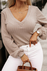 Khaki knitted jacquard top with v-neck and lantern sleeves