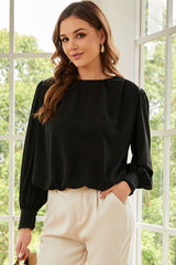 Chemisier ample plissé noir avec épaules rembourrées et poignets boutonnés-A WOMAN WE LOVE