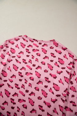 Ample with long sleeves and pink animal print