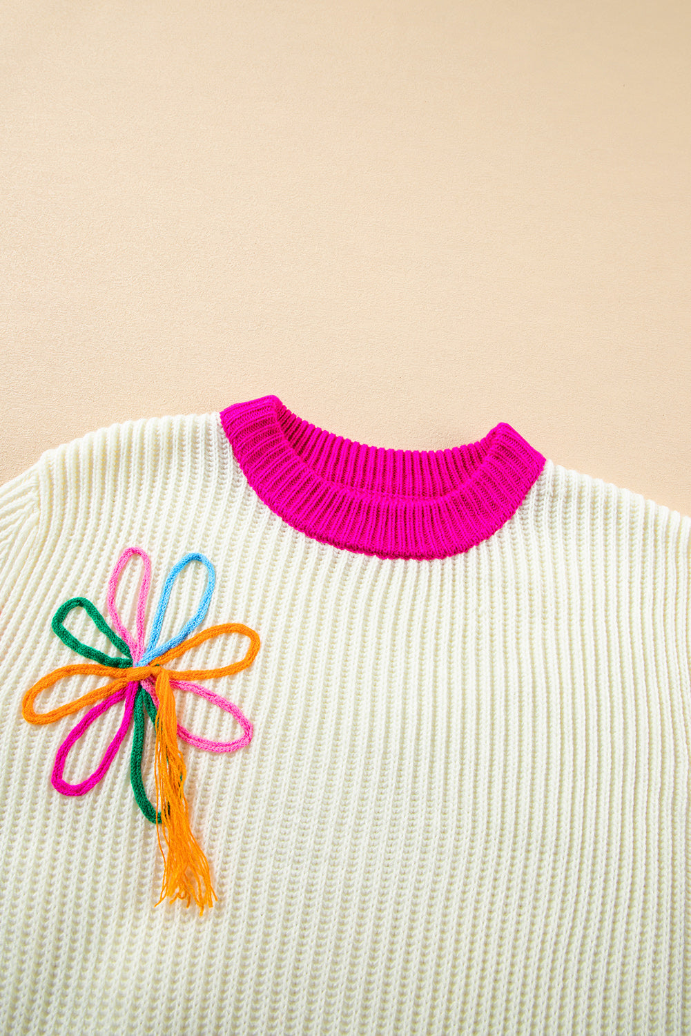 Pull ample en tricot torsadé à imprimé floral color block beige