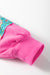 High pink sweater with mixed prints and drooping shoulder patches *