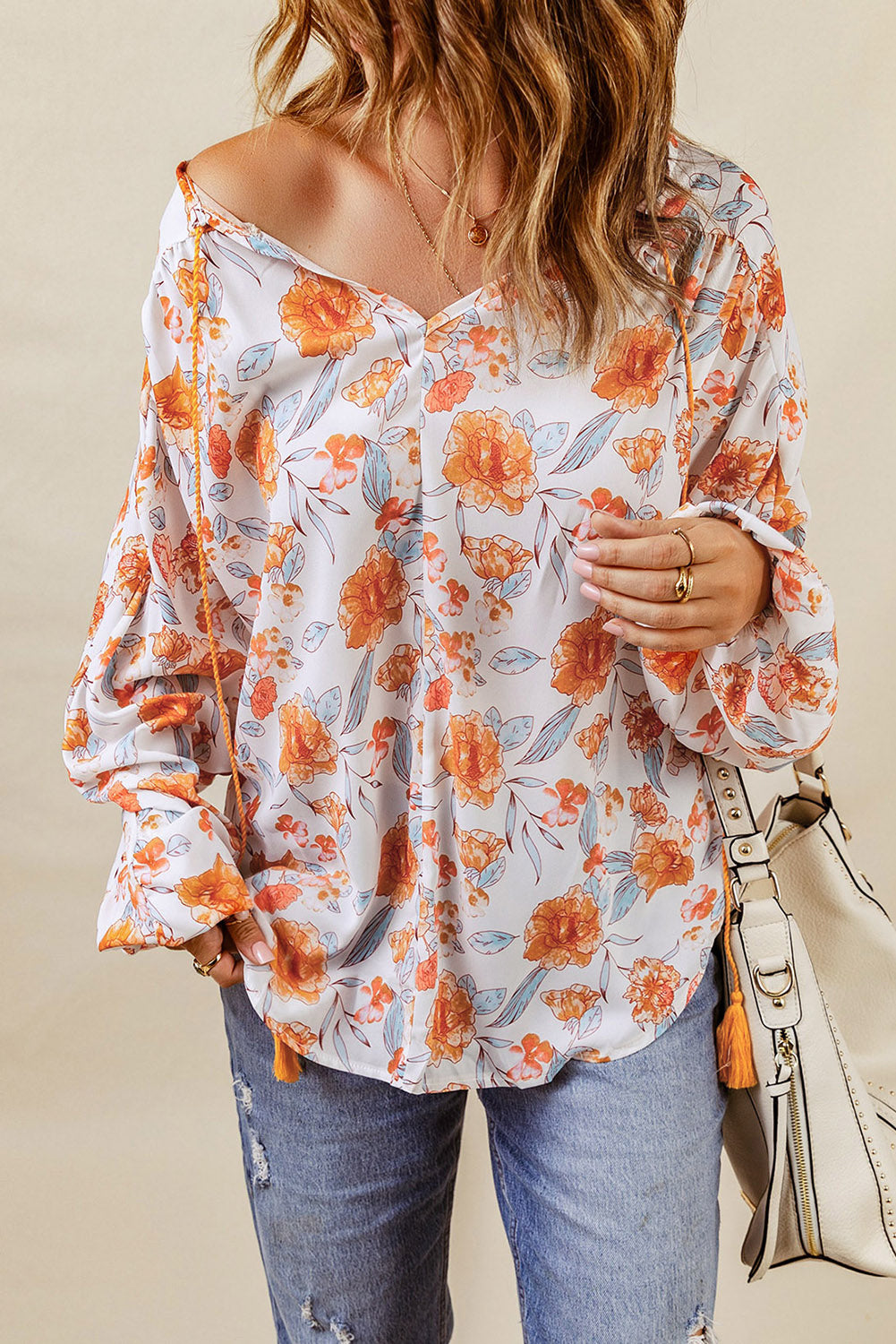 Blouse Dolman orange fendue à col en V et imprimé floral