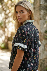 Chemise à fleurs à manches courtes et bordure