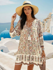 Mini-robe ample à col en V avec cordon de serrage *