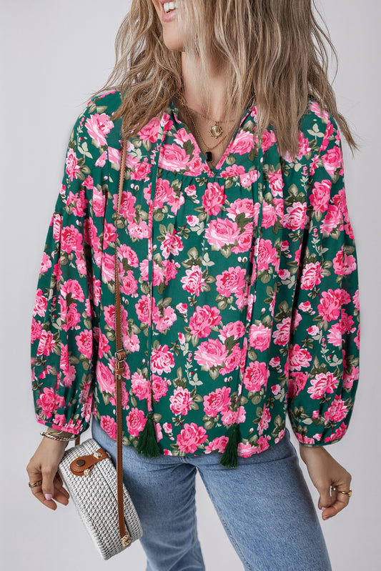 Green blouse with puffy sleeves and tied floral print collar