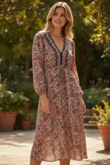 Midi dress with floral print split on the front *