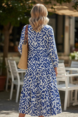 Long blue dress with abstract geometric print western
