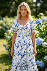 Robe mi-longue à fleurs à volants et manches courtes