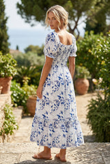 Robe mi-longue à fleurs à volants et manches courtes