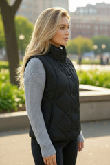 Abrigo de chaleco acolchado negro con collar alto y bolsillo abotonado