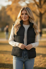 Chaleco acolchado de gran tamaño negro con cuello cuesta arriba y cremallera unida