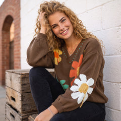 Pull marron à grandes fleurs et col V
