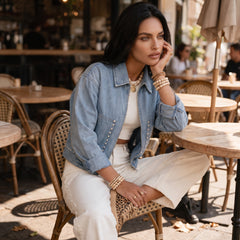 Veste en jean zippée à poches ornées de rivets