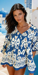 Blusa de corte fluido con manga 3/4 y estampado geométrico azul tribal