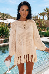 ✨ DOUCE ÉVASION – La robe maille  beige qui sublime vos instants d’été
