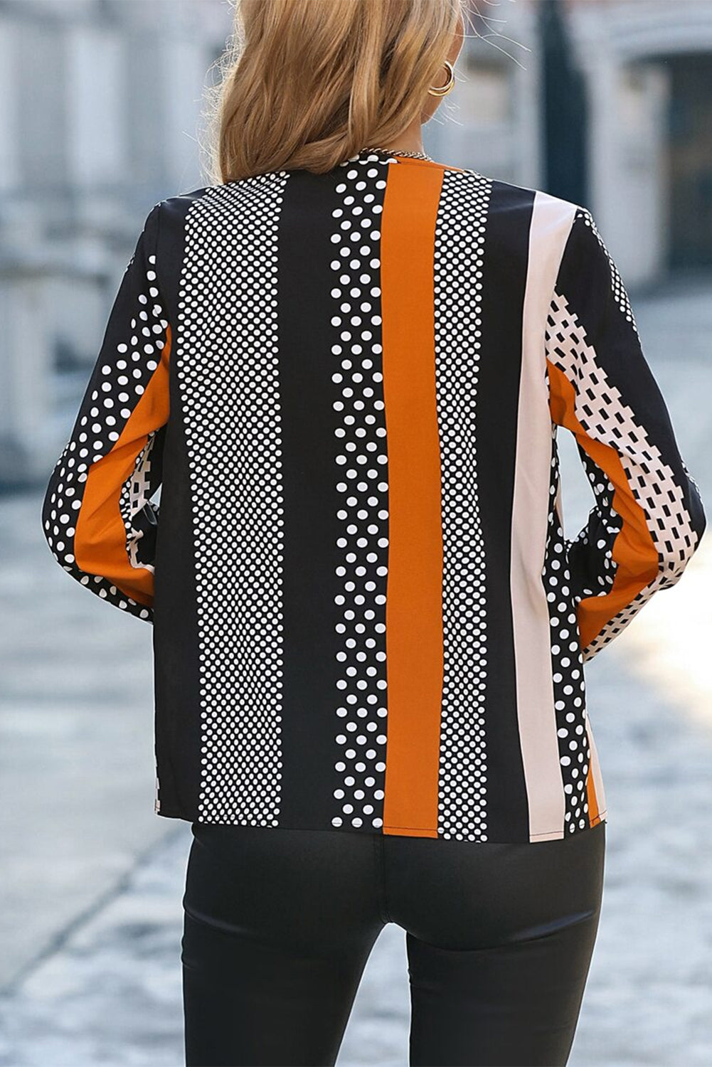 Blouse orange à imprimé géométrique et col en V cranté color block